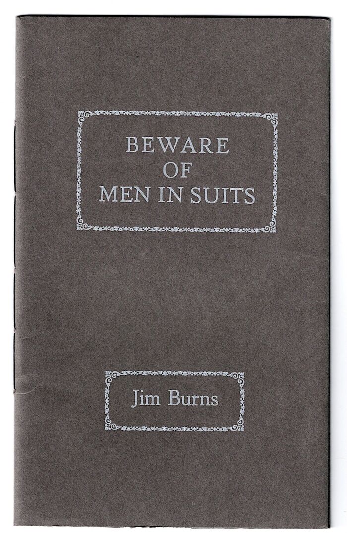 Beware of Men in Suits Image